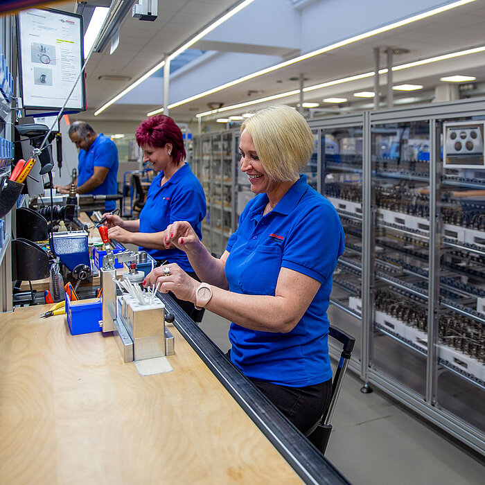 Herrmann Ultraschall employees during converter construction.
